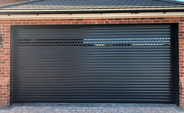 black roller shutter garage door with split
