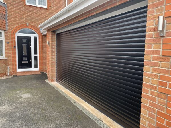 black roller shutter garage door